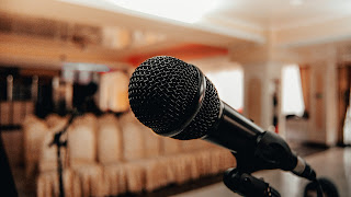 close up of a microphone in an empty room