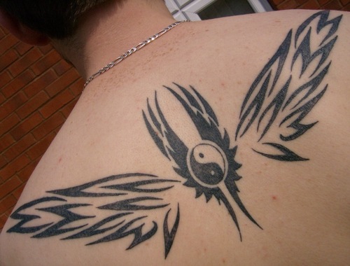 tribal wing tattoo. tribal angel wings tattoos.