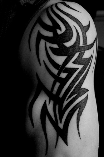 Tribal Arm And Shoulder Tattoo