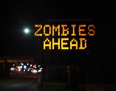 electronic road sign hacked CAUTION ZOMBIES AHEAD