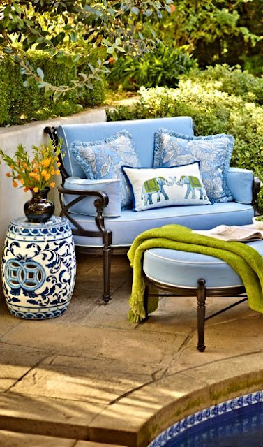 Gorgeous blue poolside chair and ottoman and Chinoiserie stool - found on Hello Lovely Studio