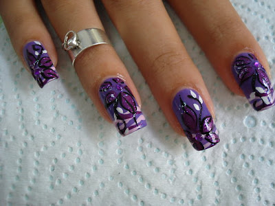 nails. Nail art. Lilac manicure with flower decoration. Nails ideas 