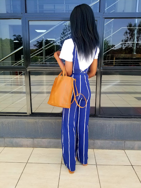 How To Wear A Striped Jumpsuit Casually