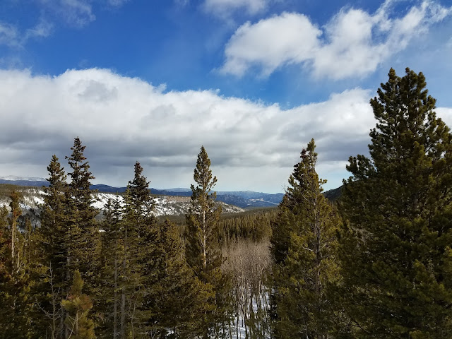 View of Rocky Mountain National Park with snow