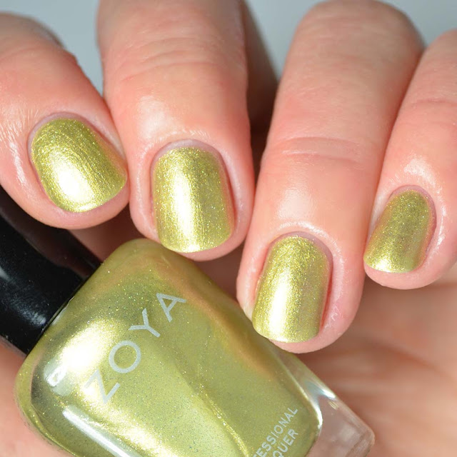 light green nail polish swatch four fingers