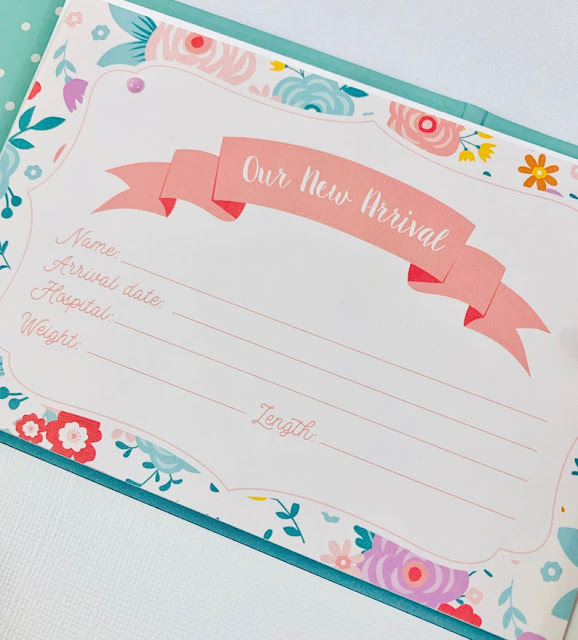Baby Girl Scrapbook Album Page with flowers and space to document birth announcement