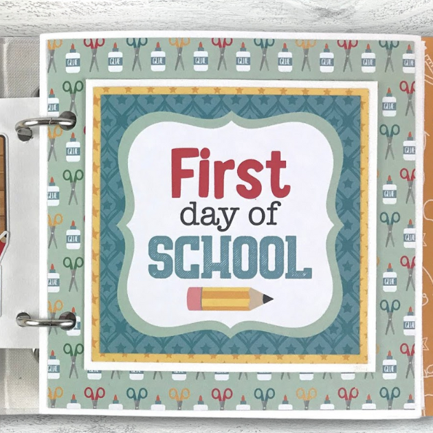 School Memories scrapbook album page with glue, scissors, a pencil, and a cute folding card