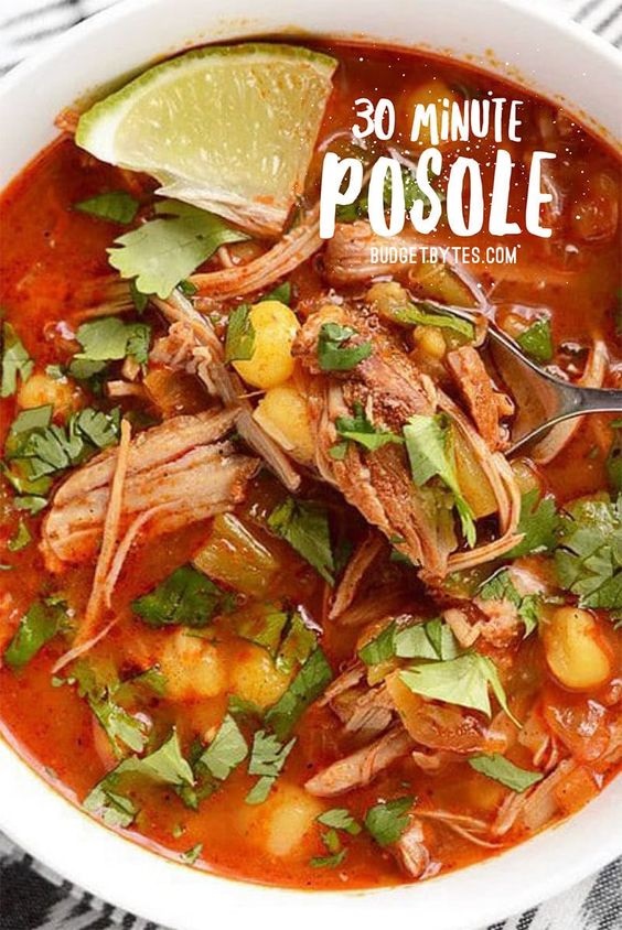 Use your leftover pulled pork and a quick homemade enchilada sauce to make this super fast Easy 30 Minute Posole