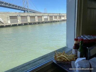 bay view from inside table at Red's Java House in San Francisco, California