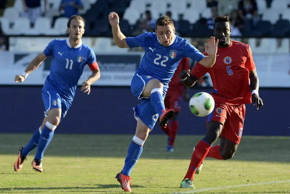 Italy player Emanuele Giaccherini scores his side's first goal against Haiti