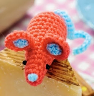 http://www.letsknit.co.uk/free-knitting-patterns/LK71-amigurumi-seal-and-mouse