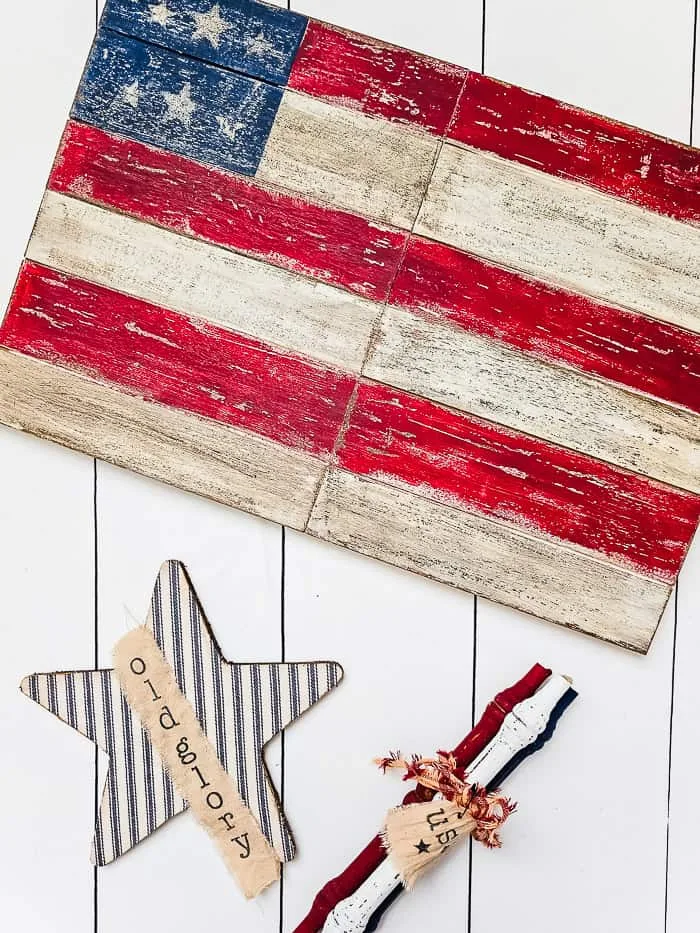 weathered wood flag, ticking star, chippy spindles