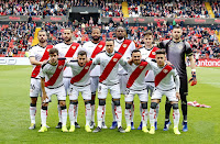 RAYO VALLECANO DE MADRID. Temporada 2018-19. Jordi Amat, Mario Suárez, Bebé, Abdoulaye Ba, Álvaro Medrán y Dimitrievski. Pozo, Tito, Raúl de Tomás, Álvaro García y Álex Moreno. RAYO VALLECANO DE MADRID 1 REAL BETIS BALOMPIÉ 1. 31/03/2019. Campeonato de Liga de 1ª División, jornada 29. Madrid, estadio de Vallecas, 14.000 espectadores. GOLES: 1-0: 35’, Raúl de Tomás. 1-1: 81’, Tello.