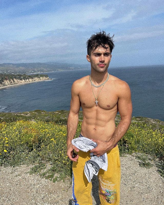 Max Ehrich shirtless hike pics.