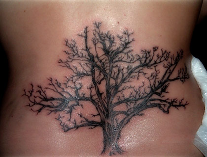 apple blossom tattoo. upper back tattoos.