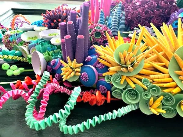 array of colorful, quilled elements resembling a sea theme