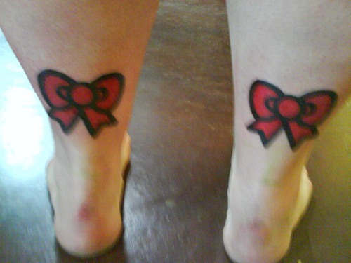 tattoo bows. Pink#39;s red ow tattoos on the