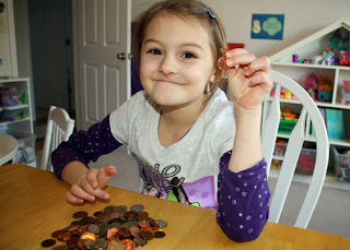 Tessa identified various coins and their worth. She compared and contrasted the coins as well.