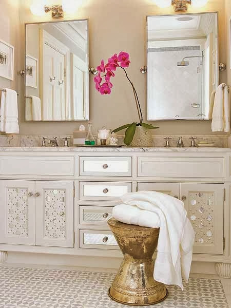 neutral master bathroom with gold accents white vanity