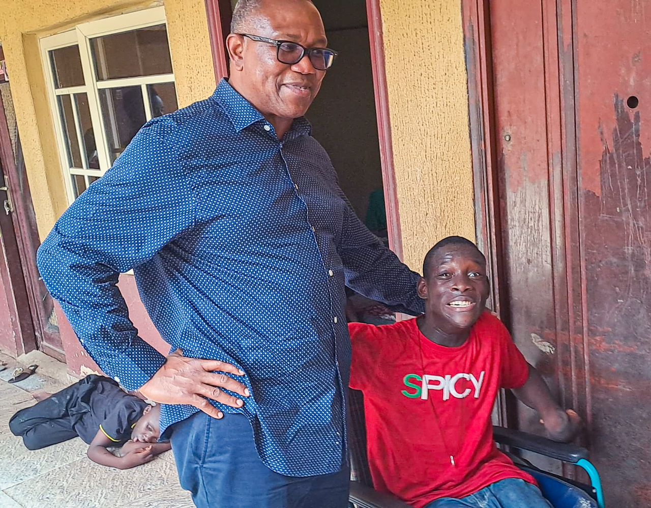 2023 Presidential candidate of the Labour Party (LP), Peter Obi, with "beloved friends" at Rehabilitation Center in Ozubulu, Anambra State on Monday 1 January, 2023 - HenrisCounty