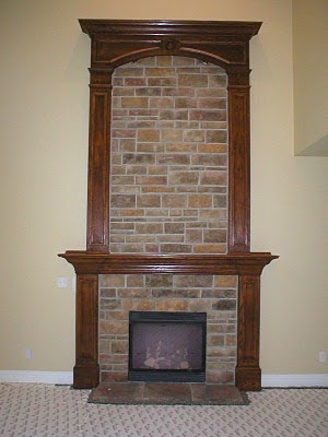 This 14' tall oak mantel we stained & varnished in the great room.