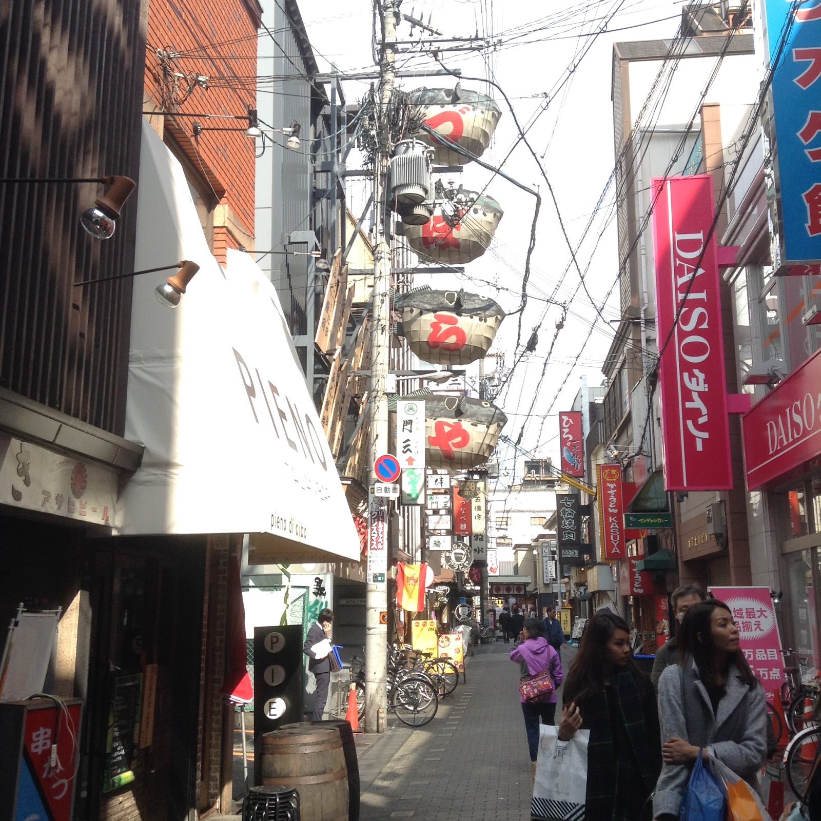 Osaka side street with Daiso and fugu fish signs