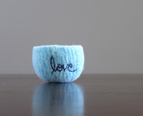 small felted bowl with the word love