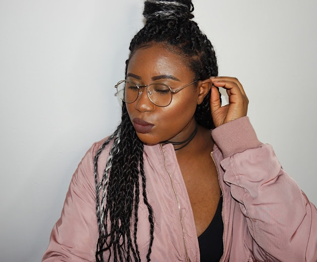 grey braids, grey braids hairstyles, brown lipstick, pink bomber jacket