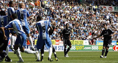 In a moment of brilliance, Deco (far right) lets fly to score the winner for Chelsea during their away match at Wigan yesterday. The Blues are now top of the early Premier League table