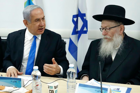 alt="Prime minister of Isreal and Health Minister discussing how to deal with the Covid 19 outbreak"