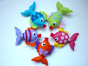 Meet the colourful 'Rainbow Kissing Fish' soon to be hung as a baby mobile. (felt kissing fish mobile )