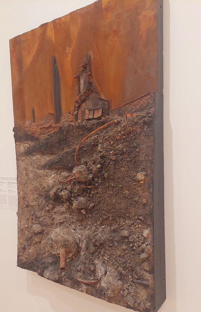 United States Steel Corp., McDonald Works, Youngstown, Ohio, 1986 by Raymon Elozua (born West Germany 1847, based in Mountaindale, New York) | Mixed media, steel, rock, slag and detritus on wood