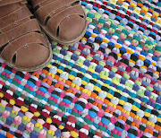 . project last year when we were away for a few days over spring break, . (knit shirt rag rug )