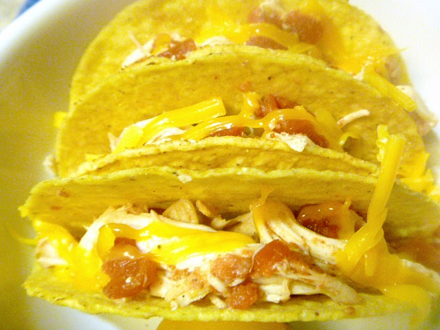 Baked Chicken Tacos: stuff the shells with cooked meat and cheese and then baking them, to crisp up the shells and get some melty cheese going.  Brilliant! - Slice of Southern