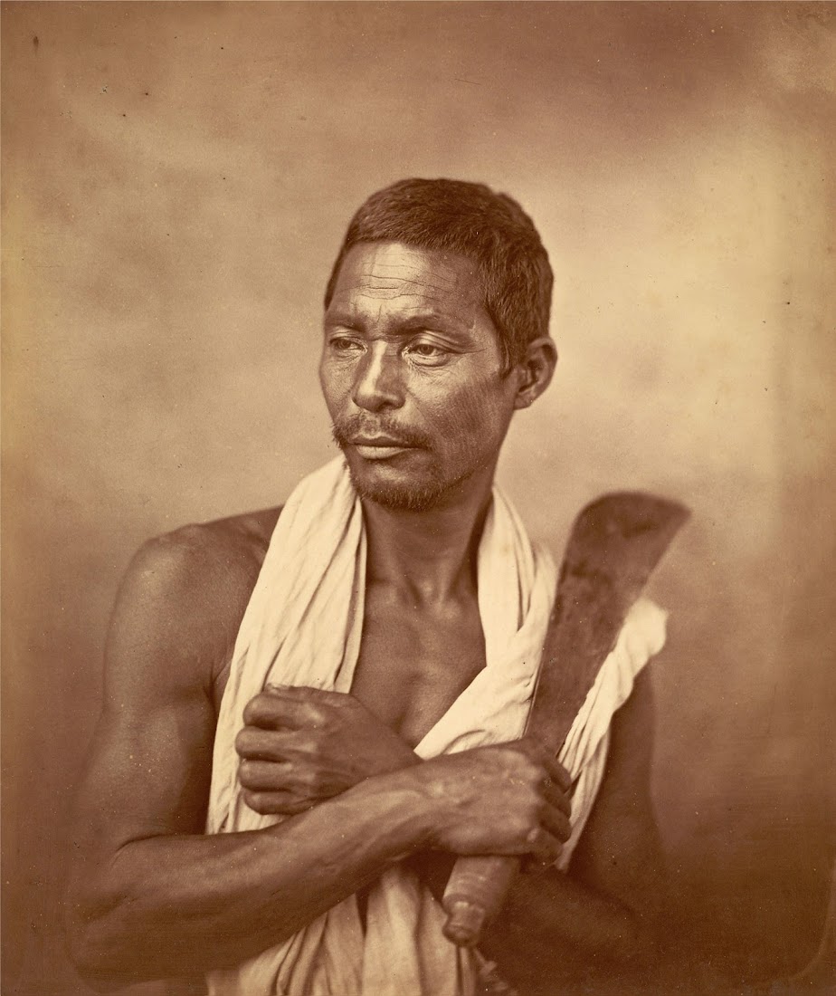 Portrait of a Man of the Kochh Mandai Tribe Holding a Thick-Bladed Agricultural Knife - Eastern Bengal 1860's