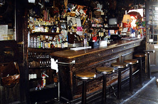 Slanted bar of Heinold's First and Last Chance Saloon in Oakland, California. During the 1906 earthquake the building sunk into swampy land leaving it slanted.