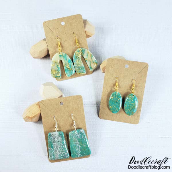 How to Make Marbled Polymer Clay Earrings!  Learn how fun and simple it is to make marbled polymer clay earrings!   Polymer clay bakes is soft to work with and bakes hard in the oven.   Marbling the clay makes gorgeous quartz crystal effects, paired with gold leaf for the ultimate classy earrings.