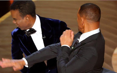 Will Smith Hits Chris Rock On Oscars Stage After He Made An Inappropriate Jokes About His Wife, Jada (Video)