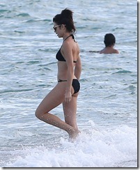 Olga-Kurylenko-Wearing-Sexy-Black-Bikini-At-The-Beach-In-Miami-13