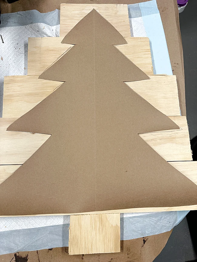 paper tree shape traced on wood