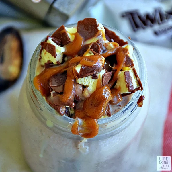 Twix Milkshake | by Life Tastes Good is a rich, chocolaty, frozen treat perfect for National Ice Cream Month. It is very thick like a Frosty and full of TWIX® Ice Cream Minis. The TWIX® Ice Cream Minis add a touch of caramel for a delicious twist on a chocolate milkshake.