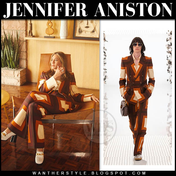 Jennifer Aniston in brown square print suit and white shoes