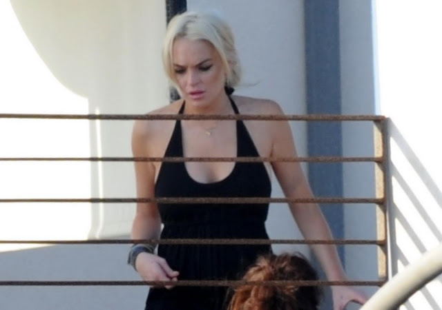 Lindsay Lohan Showing Cleavage Candids While Partying On Rooftop