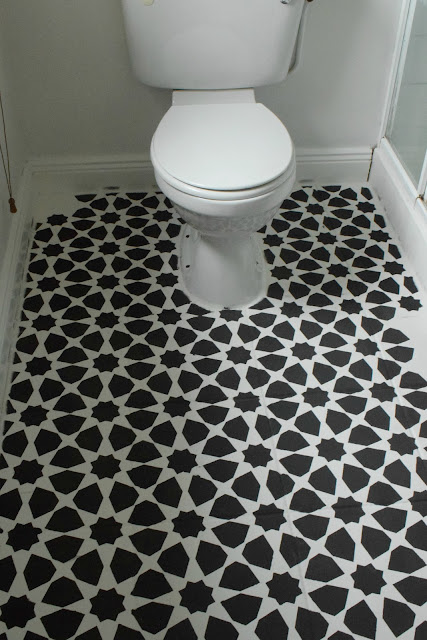 how to stencil a tile floor with chalk paint to get the look of Moroccan tile