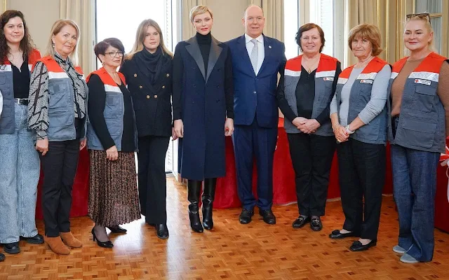 Princess Charlene wore a leather collar shearling navy wool sleeveless long vest gilet. Camille Gottlieb