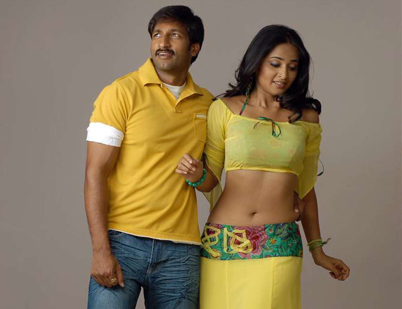 Anushka Shetty Beautiful Sillts in Yellow Dress - HD Images