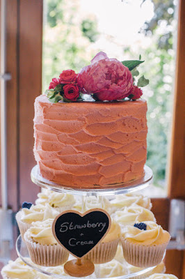 Pink vegan wedding cake topped with peonies by Purely Scrumptious