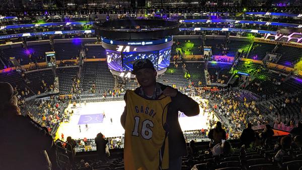 Posing with the free commemorative Pau Gasol jersey that I received at the L.A. Lakers-Memphis Grizzlies game on March 7, 2023.