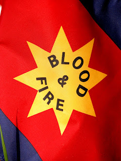 “blood and fire” is the motto of which organization?