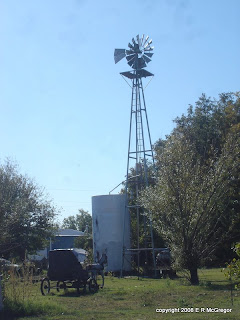 Windmill and interesting artifacts in yard